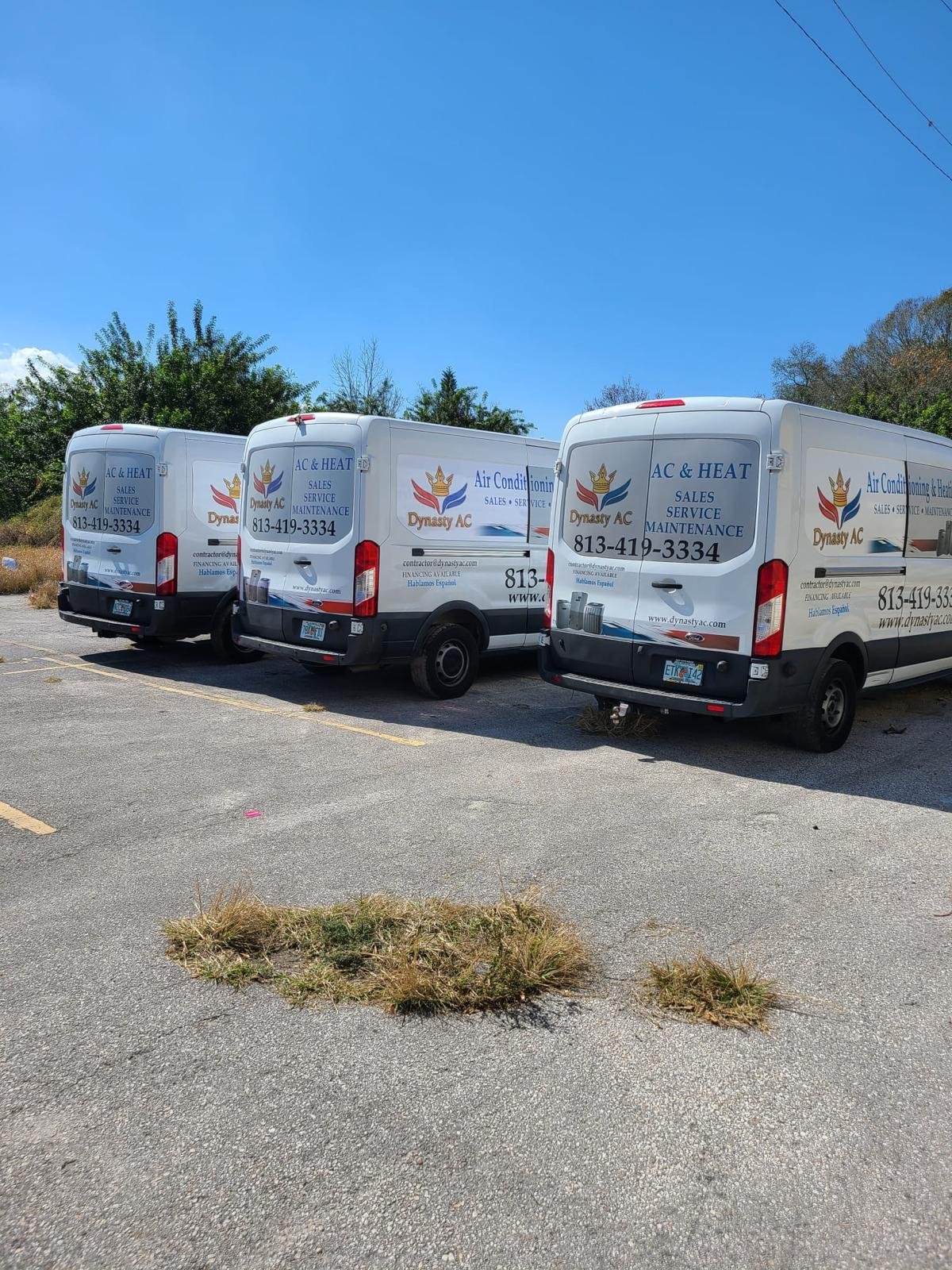 Three Dynasty AC service vans in a row